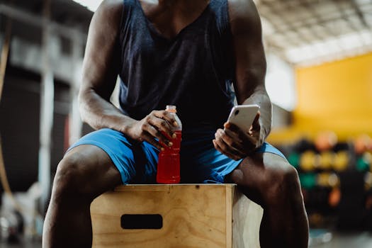 athlete hydrating after workout