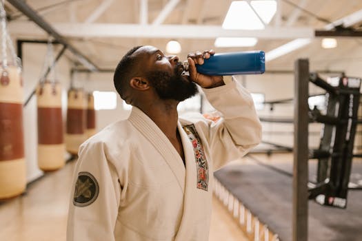 image of an athlete drinking water