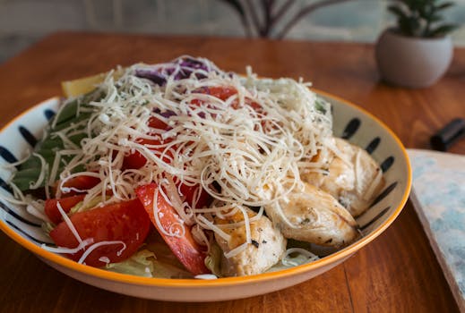 plate of grilled chicken with vegetables