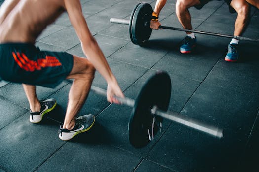 a man lifting weights in a gym